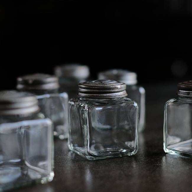 Small glass canisters (sold individually)