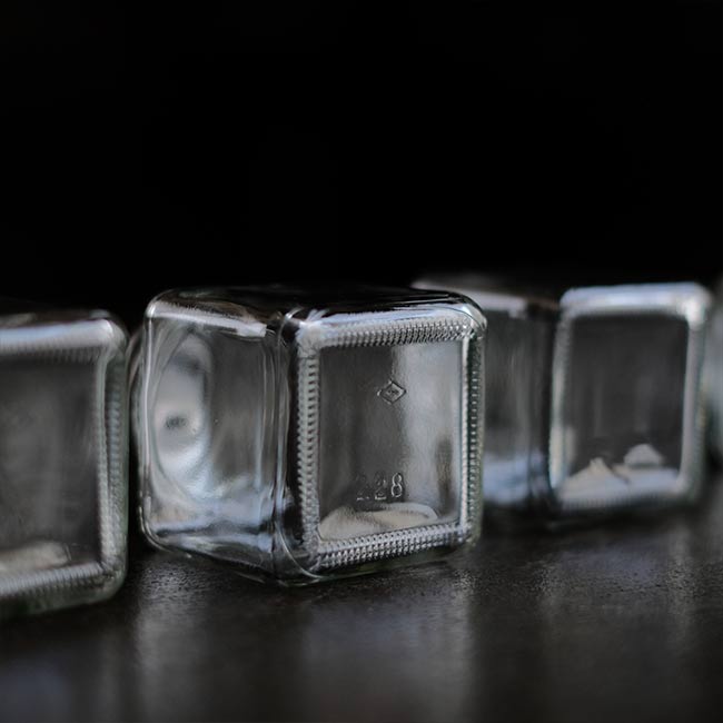 Small glass canisters (sold individually)