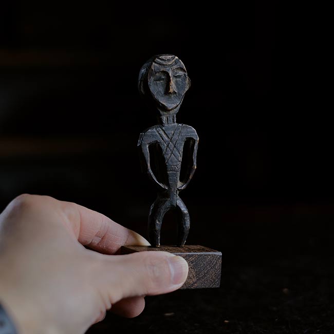 A person leaning slightly