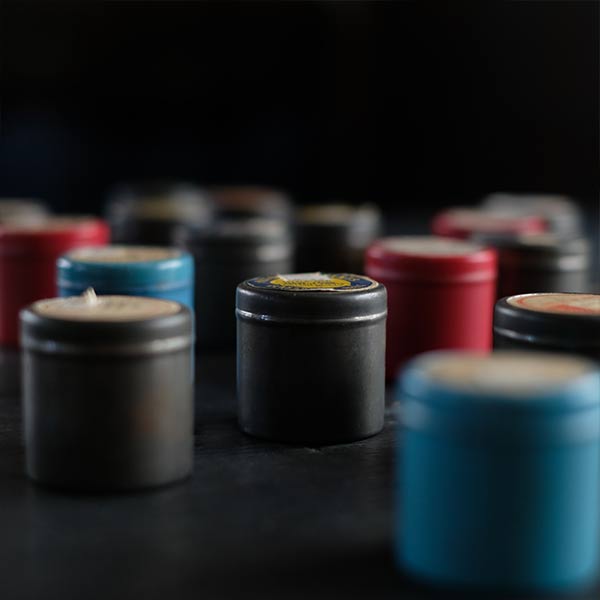 Tin case containing film
