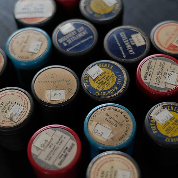 Tin case containing film
