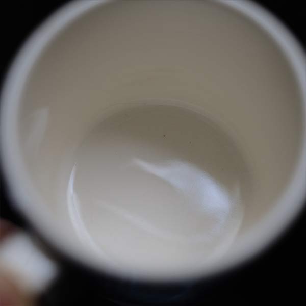 Hard ceramic cup and saucer
