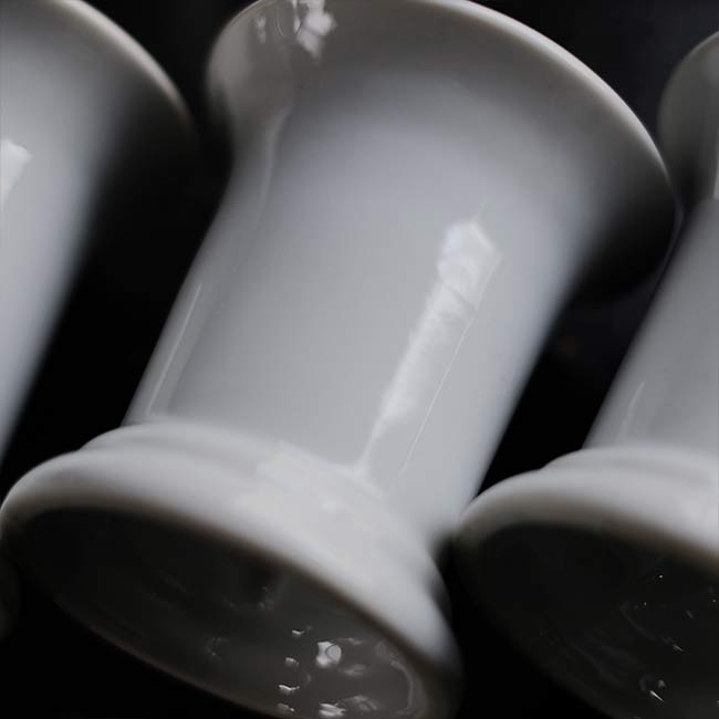 White porcelain toothbrush holder
