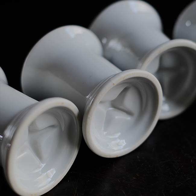 White porcelain toothbrush holder