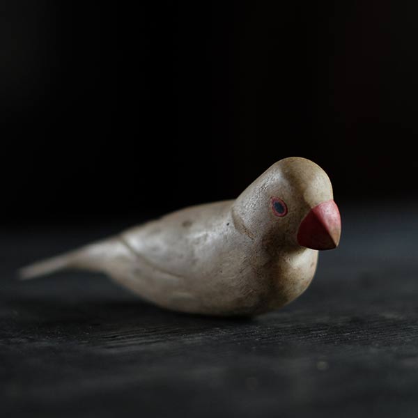 Wooden carving of Java sparrow
