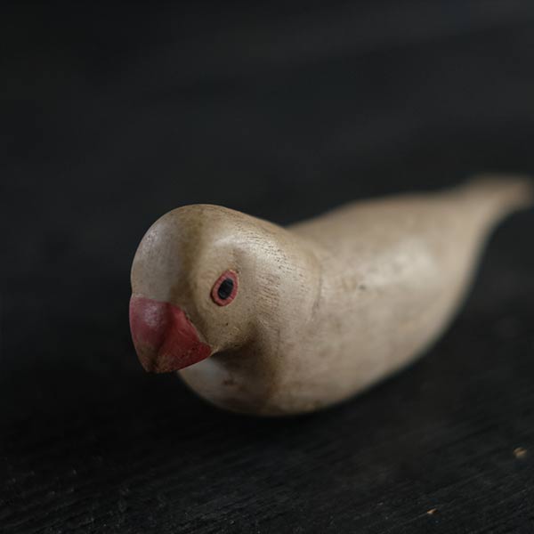 Wooden carving of Java sparrow