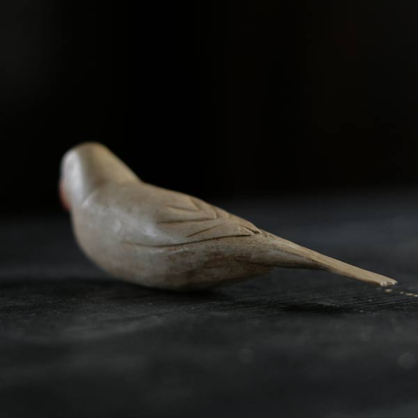 Wooden carving of Java sparrow