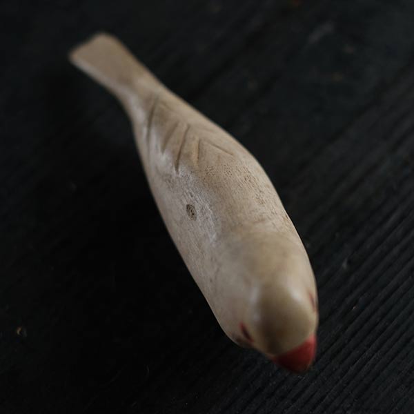 Wooden carving of Java sparrow