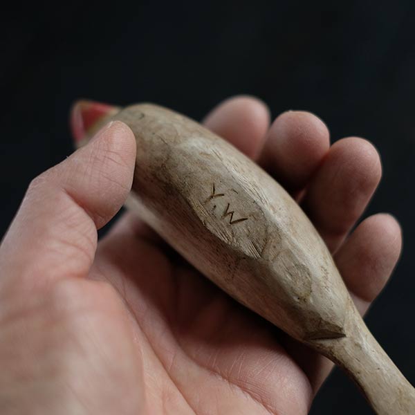 Wooden carving of Java sparrow