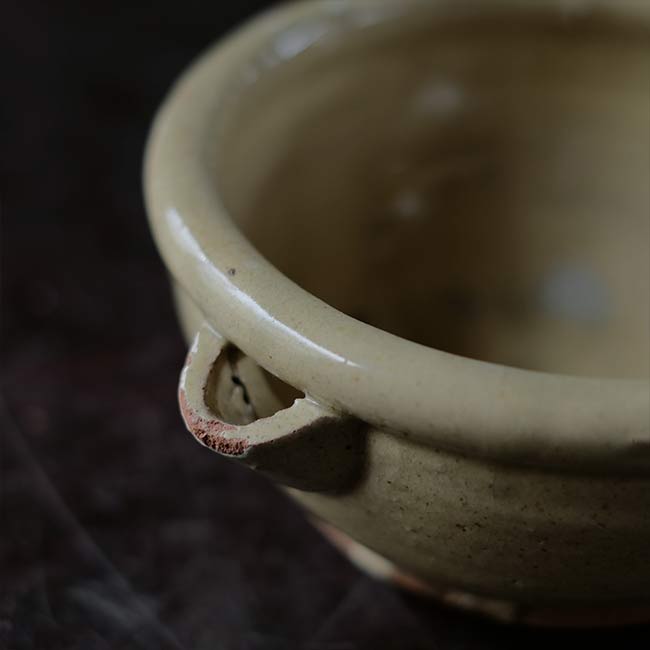 Yellow glazed sake cup