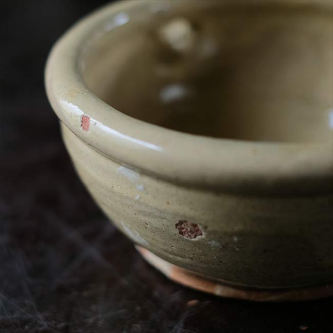 Yellow glazed sake cup