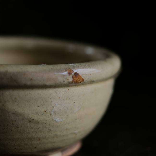 Yellow glazed sake cup