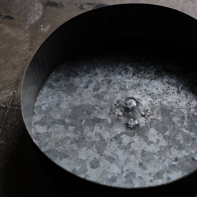 Black tin can