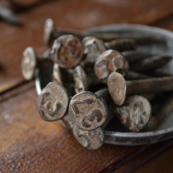 Bent date nails (sleeper nails)