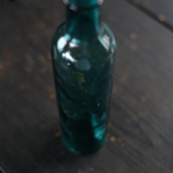 thin blue bottle