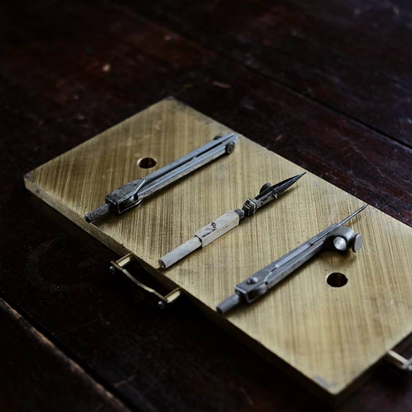 Brass plate with a small handle