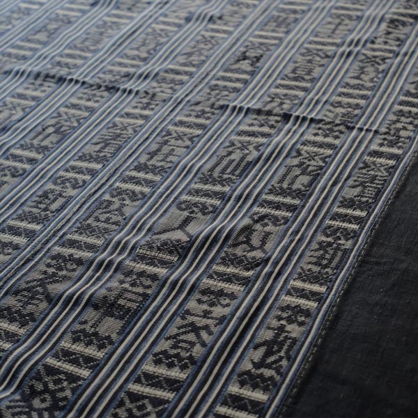 Miao ethnic blanket with woven characters