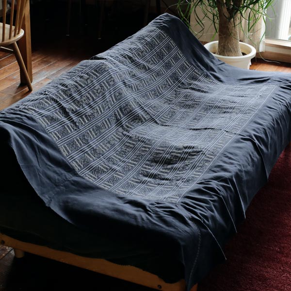 Miao ethnic blanket with woven characters