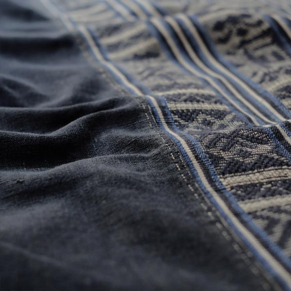 Miao ethnic blanket with woven characters