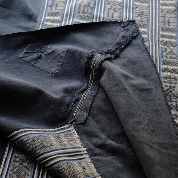 Miao ethnic blanket with woven characters