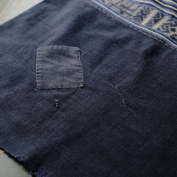 Miao ethnic blanket with woven characters