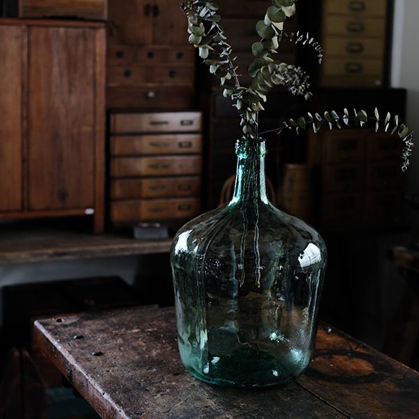 Small sea green demijohn bottle