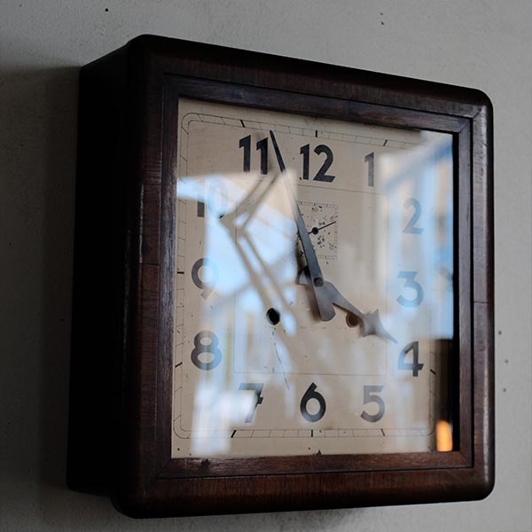 Square wall clock of unknown manufacturer, battery-operated quartz movement replaced