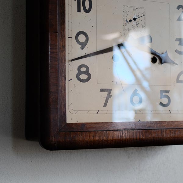 Square wall clock of unknown manufacturer, battery-operated quartz movement replaced