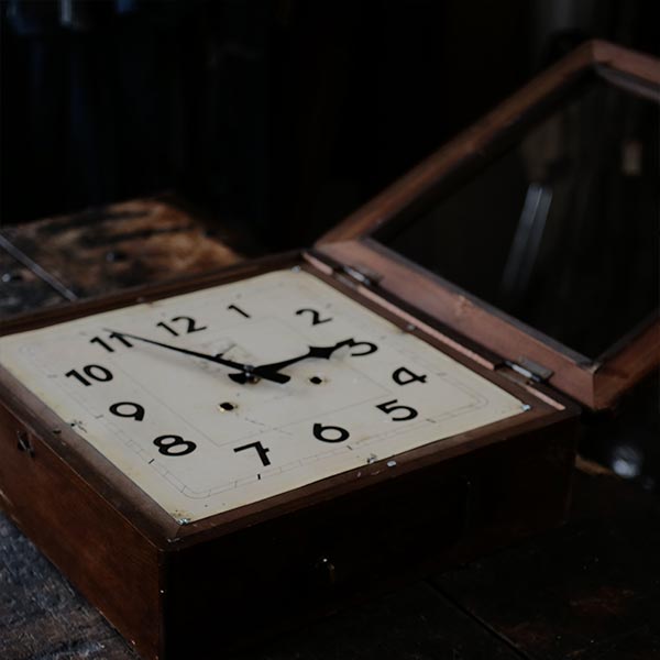 Square wall clock of unknown manufacturer, battery-operated quartz movement replaced