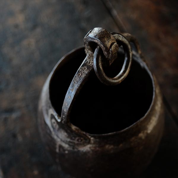Iron bucket in a well