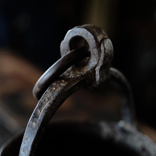 Iron bucket in a well