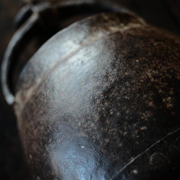 Iron bucket in a well