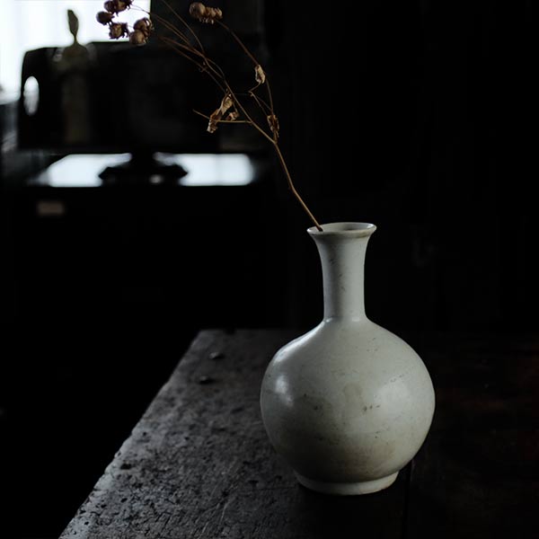 White ceramic sake bottle