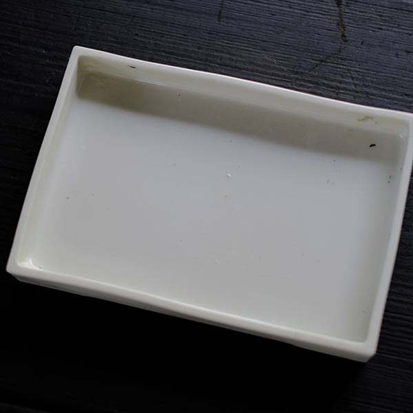 White porcelain water basin