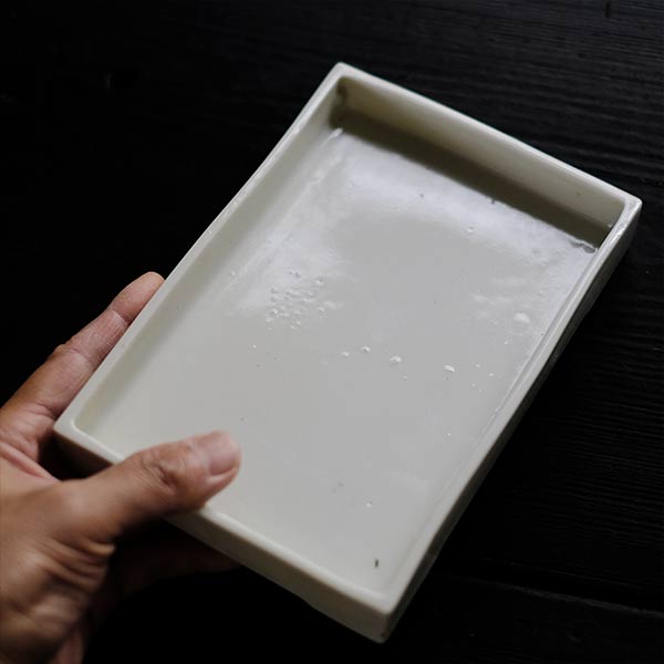 White porcelain water basin