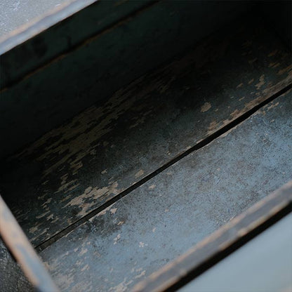 Wooden box with peeling paint