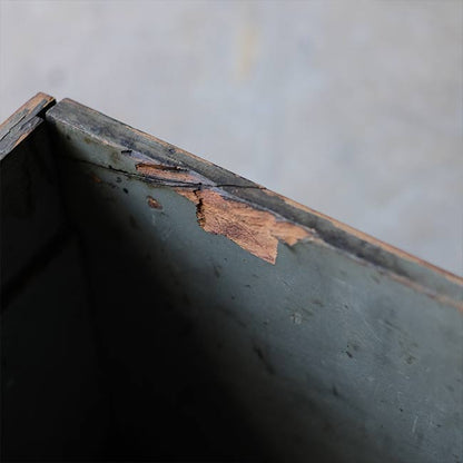 Wooden box with peeling paint