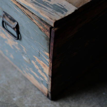 Wooden box with peeling paint