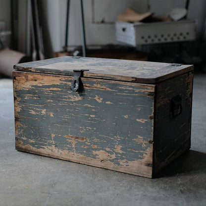 Wooden box with peeling paint