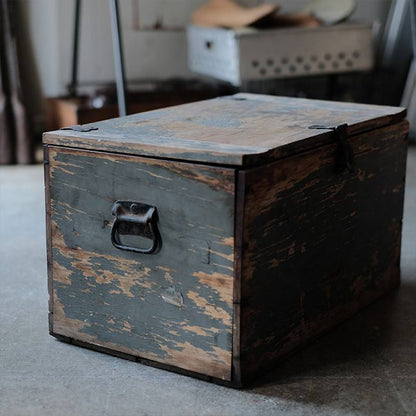 Wooden box with peeling paint