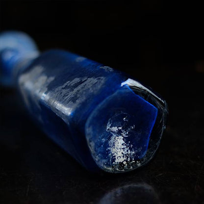 Silvered blue bottle