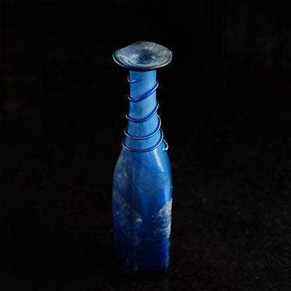 Silvered blue bottle