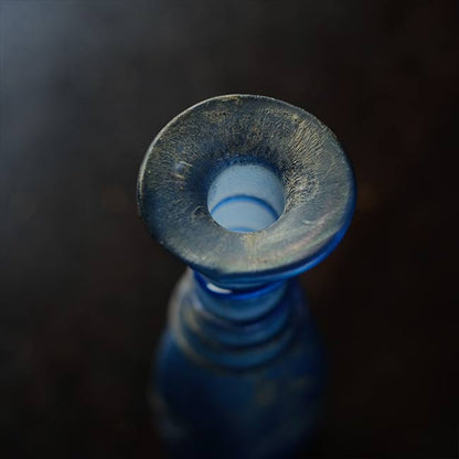 Silvered blue bottle