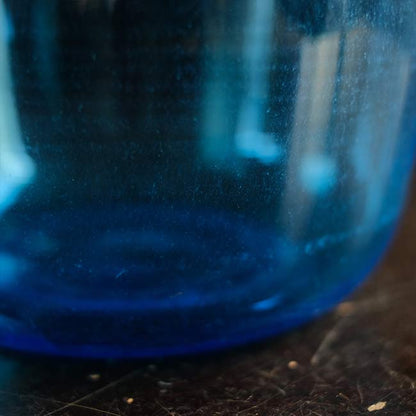 Small blue demijohn bottle