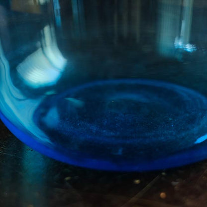 Small blue demijohn bottle