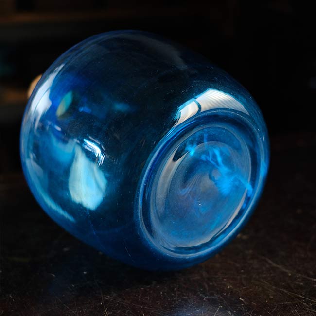 Small blue demijohn bottle