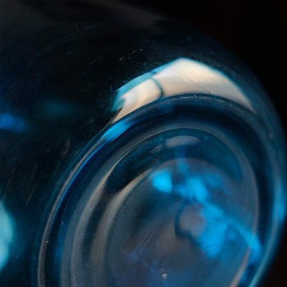 Small blue demijohn bottle