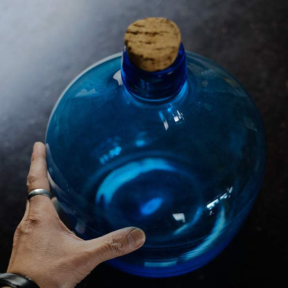 Small blue demijohn bottle