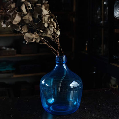 Small blue demijohn bottle