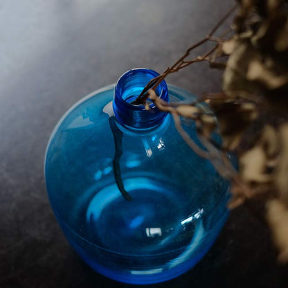 Small blue demijohn bottle